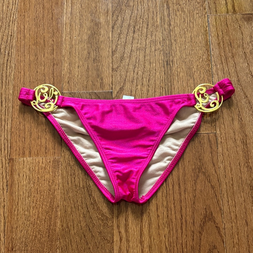 Luli Fama hot pink low rise bikini bottoms gold O ring size M